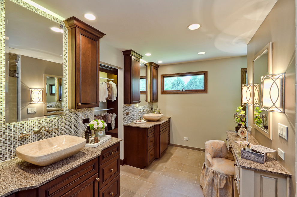 This is an example of a traditional bathroom in Chicago with granite benchtops and a vessel sink.