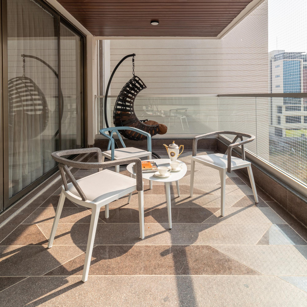 Design ideas for a modern balcony in Ahmedabad.