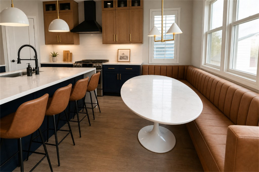 AFTER: RANGE WALL, NAVY CABINETS & LEATHER BANQUETTE