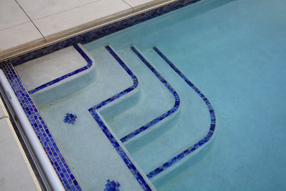 Photo of a contemporary pool in Cleveland.