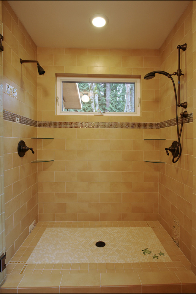 Arts and crafts bathroom in Portland with a double shower, yellow tile and mosaic tile floors.