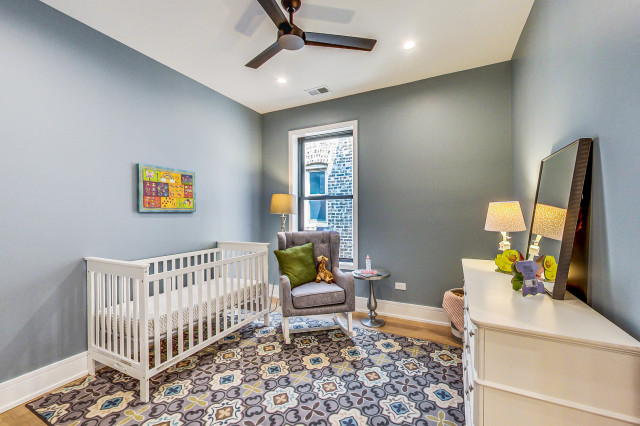 Modern Gray Bedroom with Oak Floors and Black-Framed Windows contemporary-nursery