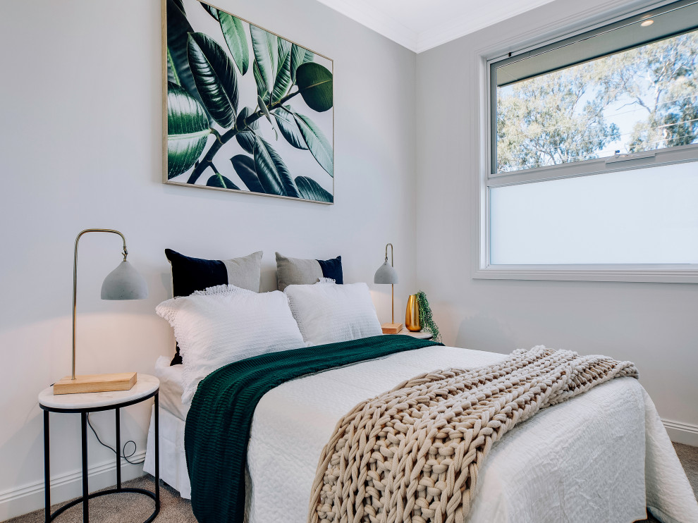 Contemporary bedroom in Adelaide with grey walls, carpet and grey floor.