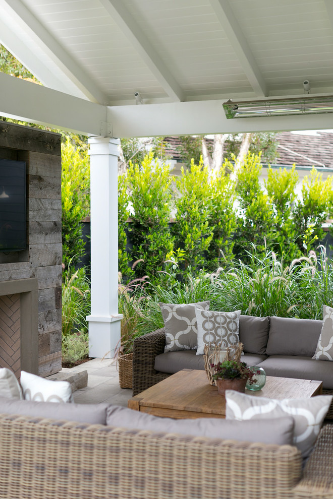 Inspiration for a transitional backyard patio in Orange County.