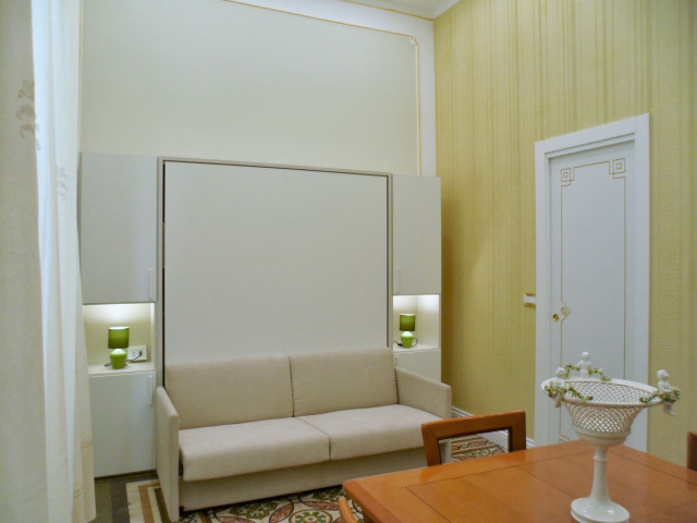 A old flat wiht two rooms reorganized. american-southwest-living-room