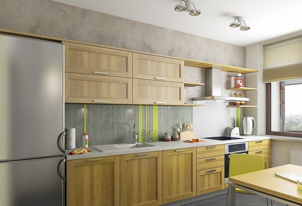 This is an example of a small transitional kitchen in London.