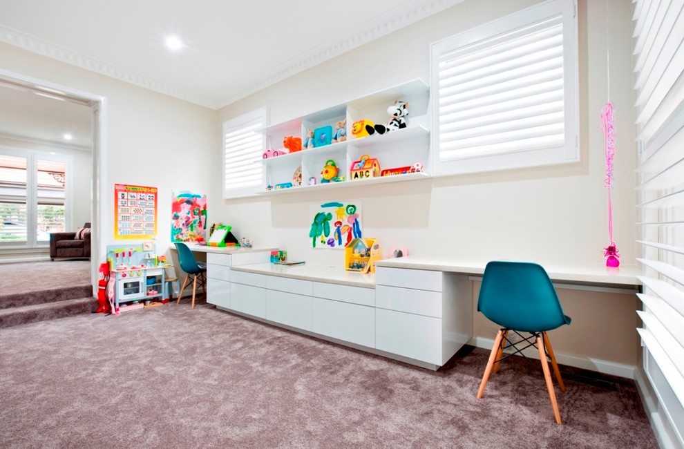 This is an example of a mid-sized contemporary gender-neutral kids' playroom in Melbourne with white walls and carpet.
