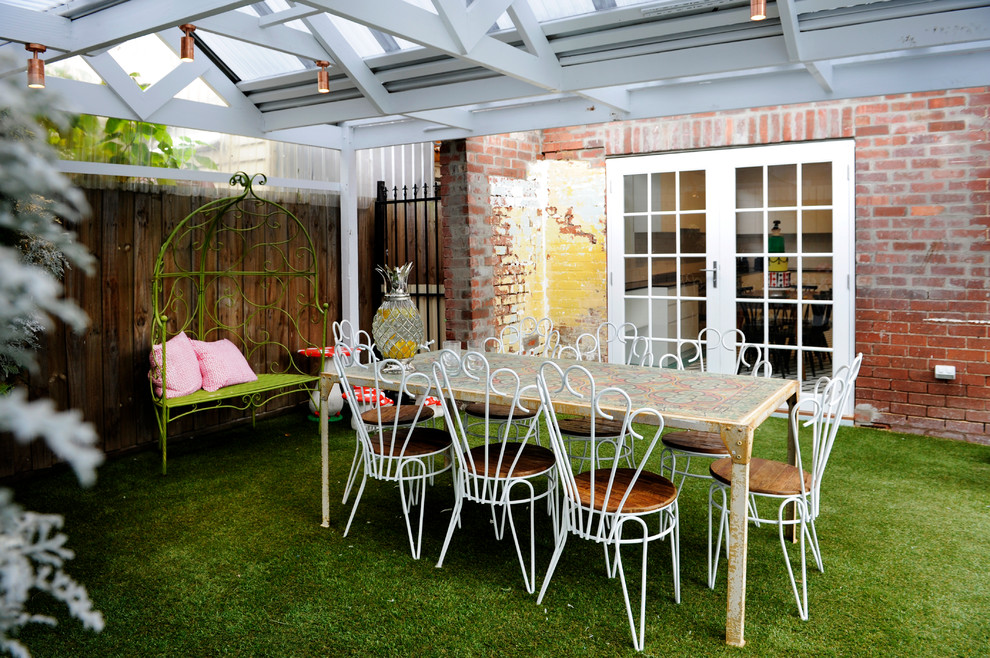 Inspiration for an industrial backyard patio in Melbourne.