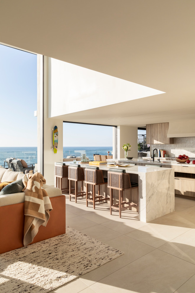Inspiration for a transitional kitchen remodel in San Diego with marble countertops and paneled appliances