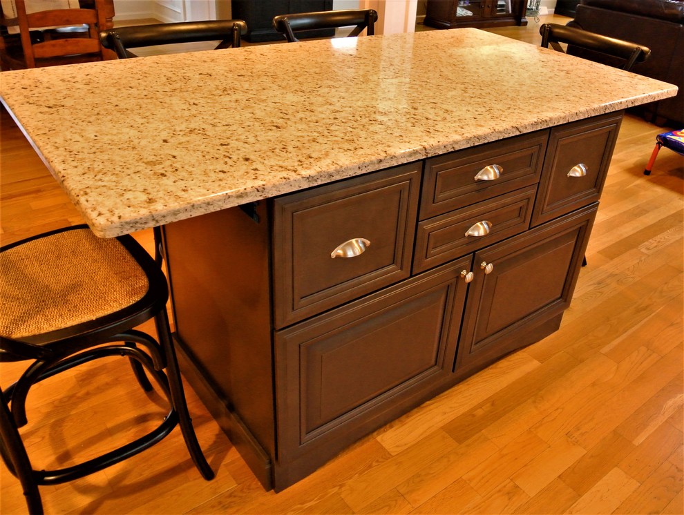 Transitional light wood floor eat-in kitchen photo in Boston with granite countertops and an island