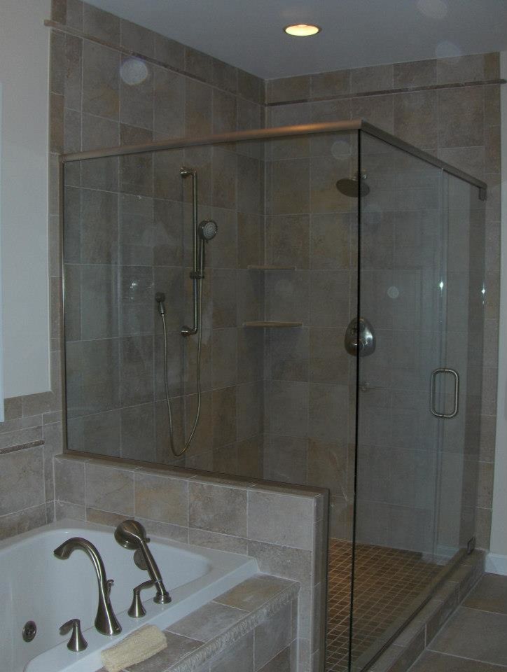 Inspiration for a mid-sized master stone tile ceramic tile drop-in bathtub remodel with white walls