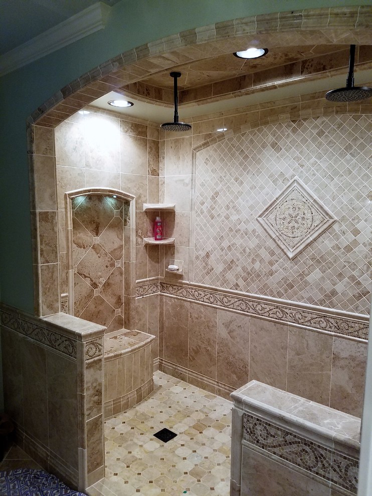 Expansive mediterranean master bathroom in Nashville with a double shower, beige tile, porcelain tile, green walls, porcelain floors, beige floor and an open shower.
