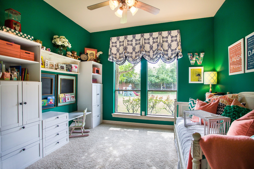 Inspiration for a mid-sized traditional gender-neutral kids' playroom for kids 4-10 years old in Houston with green walls, carpet and white floor.