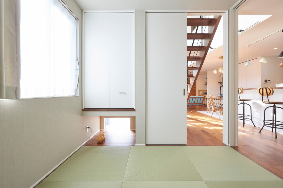 Foto di un soggiorno etnico con pavimento in tatami