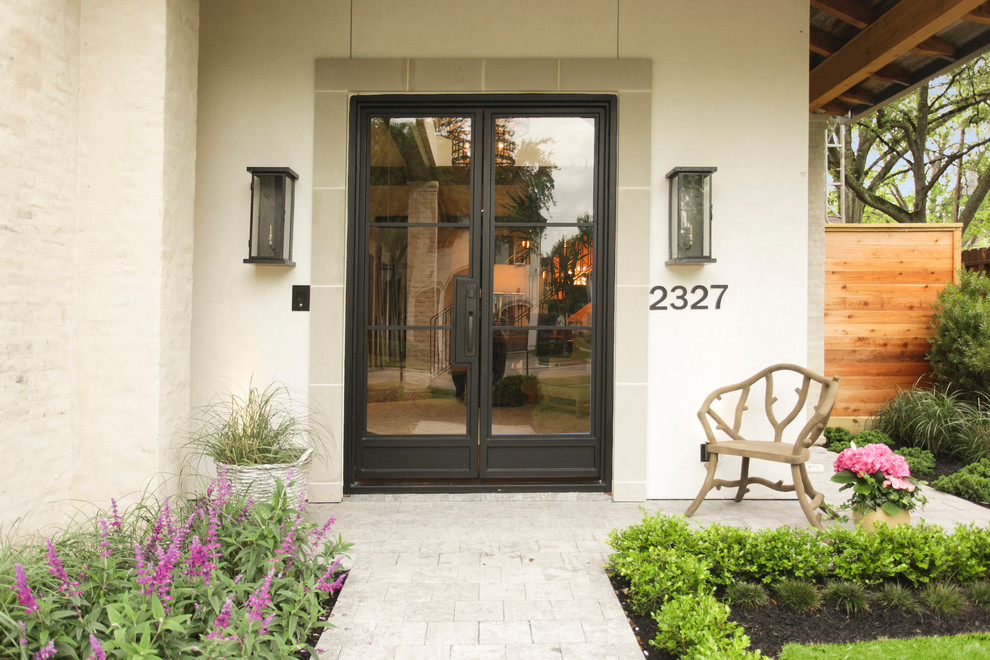 Transitional front door in Houston with a double front door and a glass front door.