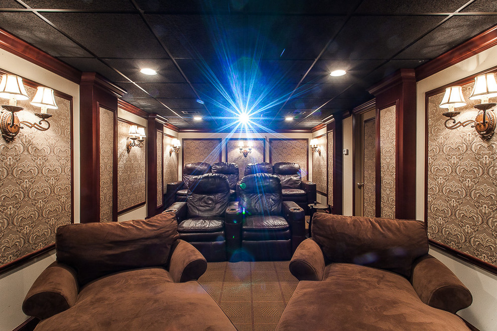 Small eclectic enclosed home theatre in New York with a projector screen, brown walls and carpet.