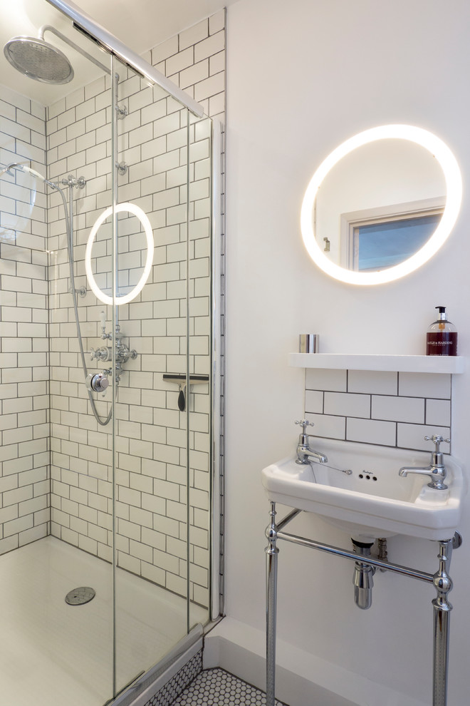 Design ideas for an industrial bathroom in London with white tile, subway tile, an alcove shower, a console sink, white walls and mosaic tile floors.