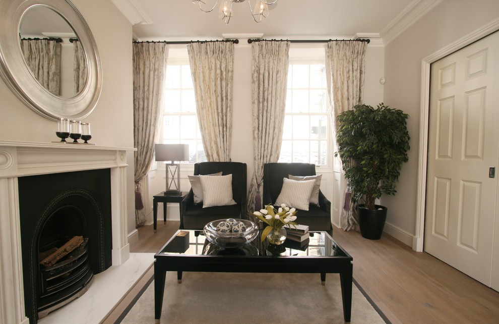 This is an example of a transitional living room in Surrey.