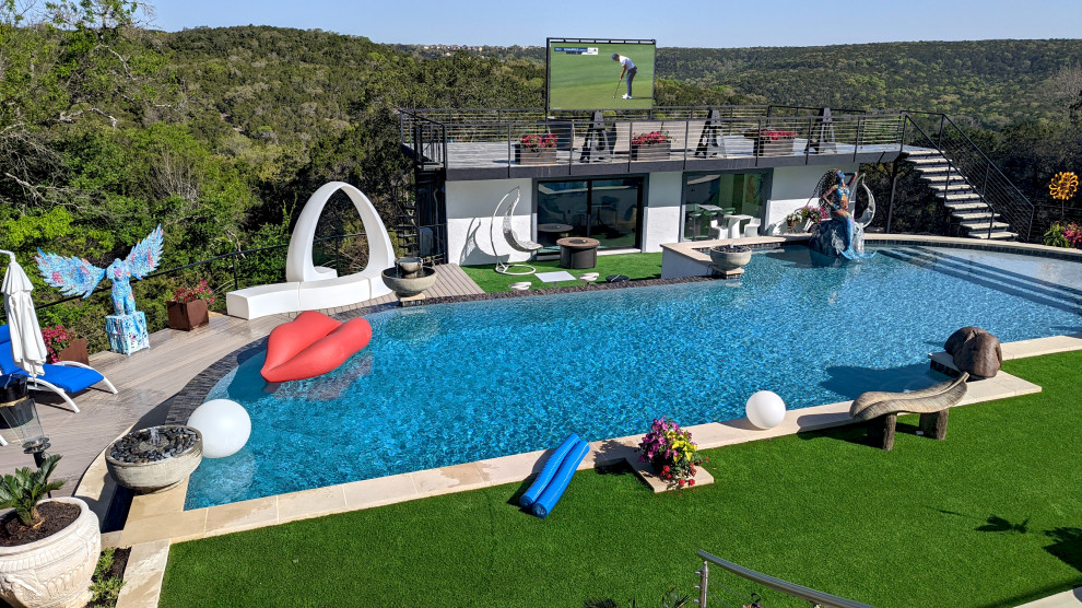 Inspiration for a large modern rooftop pool remodel in Austin