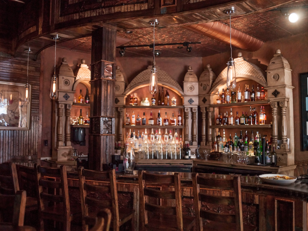 Mountain style wine cellar photo in Austin