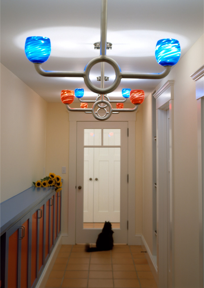Hallway - large contemporary ceramic tile hallway idea in San Francisco with beige walls