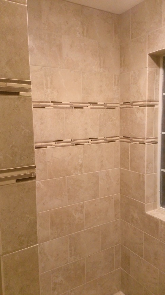 Photo of a contemporary bathroom in Austin with a double shower, beige tile and ceramic tile.