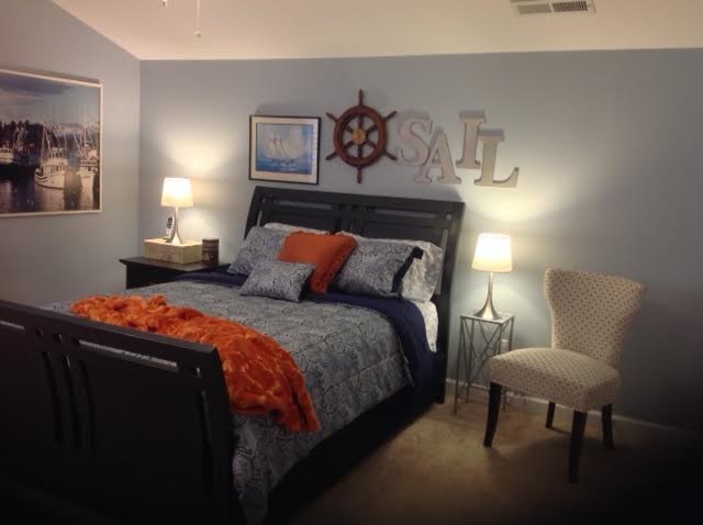 Example of a transitional bedroom design in Raleigh