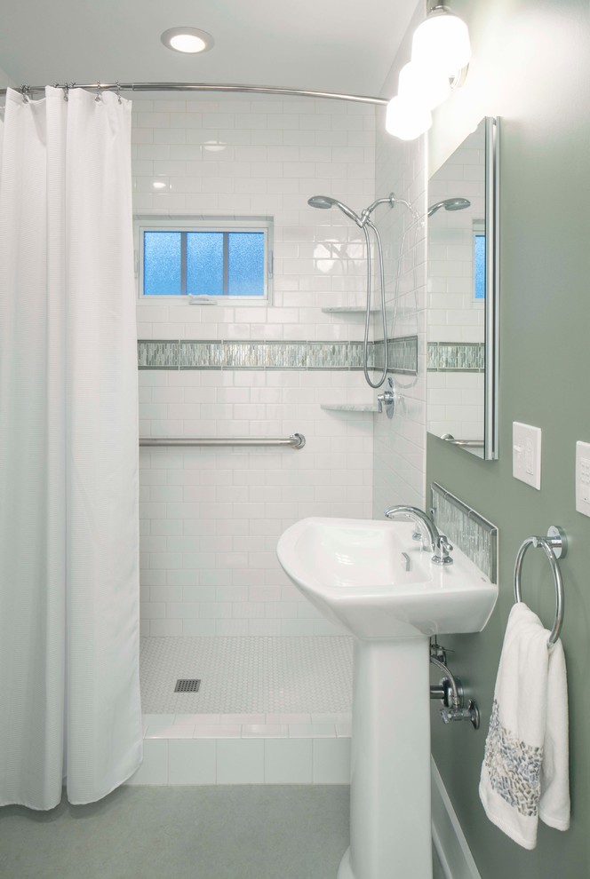 Inspiration for a small transitional bathroom in Portland with a pedestal sink, an alcove shower, a two-piece toilet, white tile, subway tile, green walls and linoleum floors.