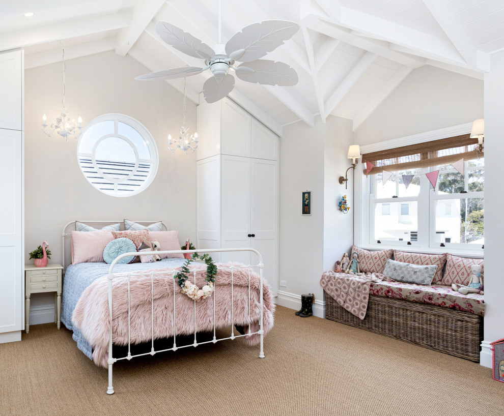 Traditional kids' bedroom in Perth with carpet, beige floor and exposed beam for girls.