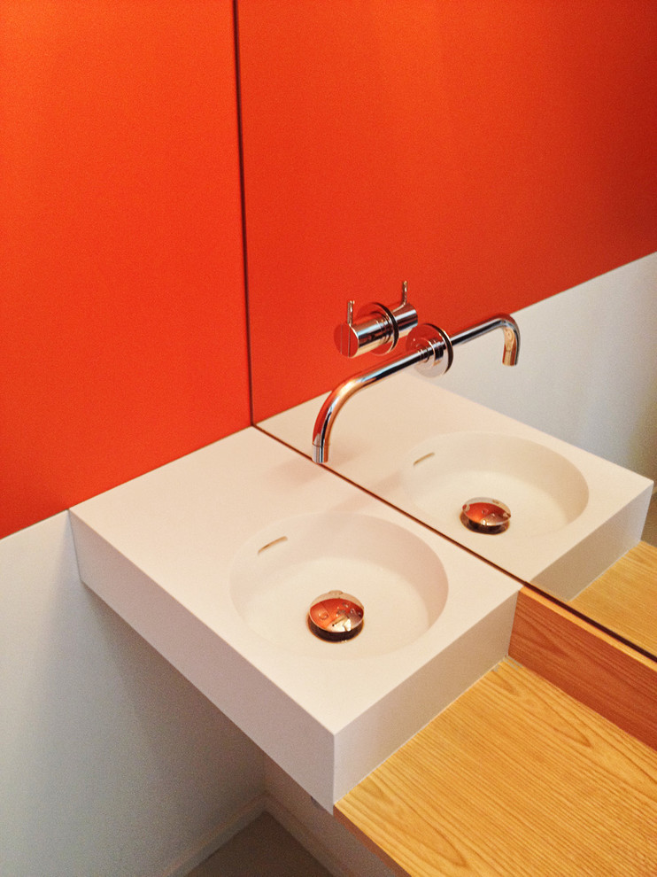 Photo of a contemporary powder room in Seattle.