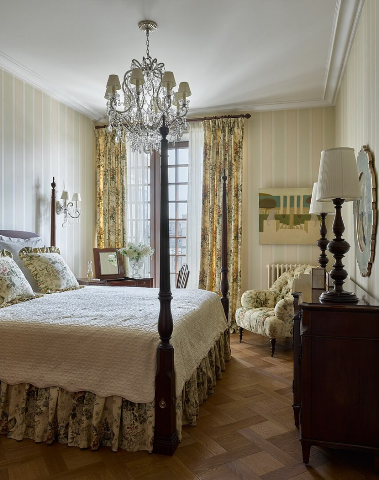 This is an example of a medium sized traditional master bedroom in Moscow with green walls, medium hardwood flooring, no fireplace, brown floors and wallpapered walls.