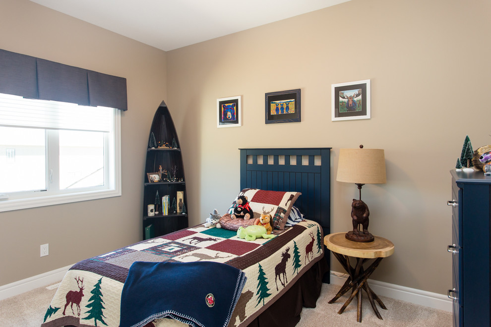 Design ideas for a small traditional kids' bedroom for kids 4-10 years old and boys in Calgary with beige walls and carpet.