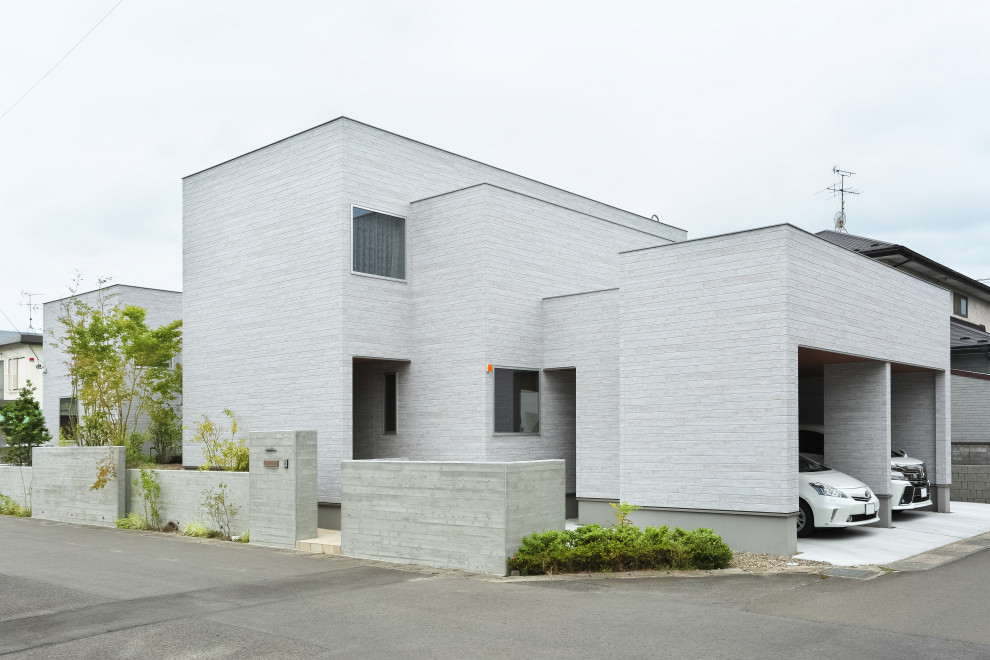 他の地域にあるおしゃれな家の外観の写真