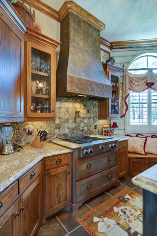 Photo of an expansive mediterranean kitchen in Dallas.