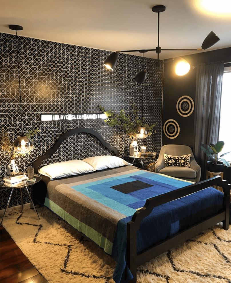 Modern bedroom in Orange County with black walls.