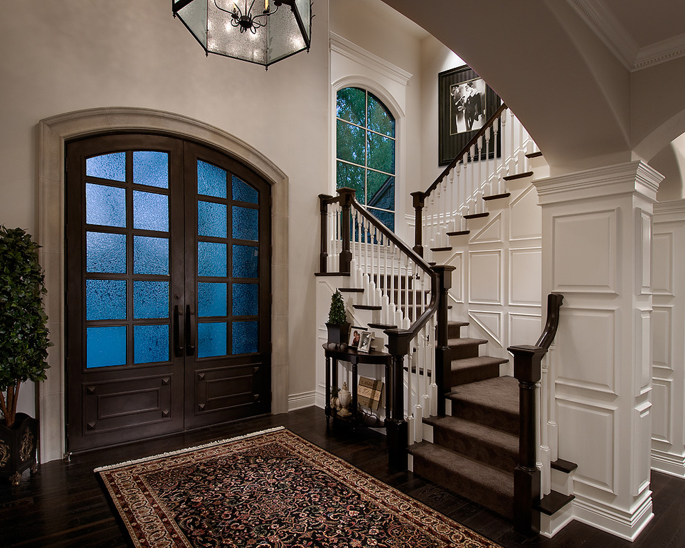 Photo of a large traditional foyer in Phoenix with a double front door.