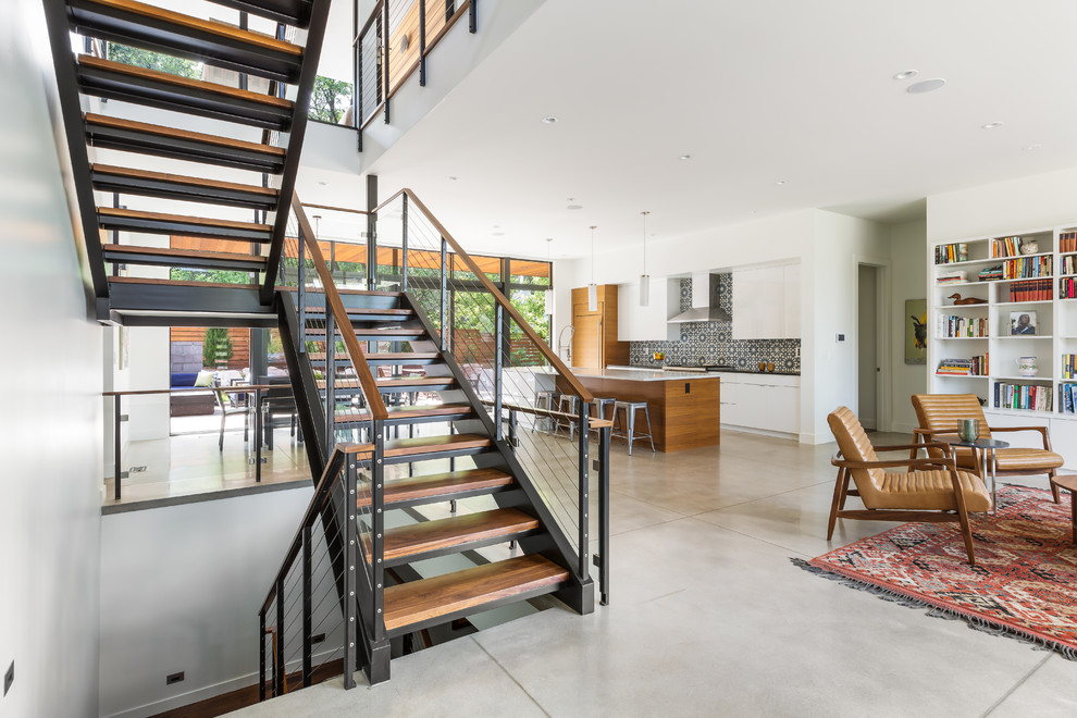 Photo of a midcentury staircase in Denver with metal railing.