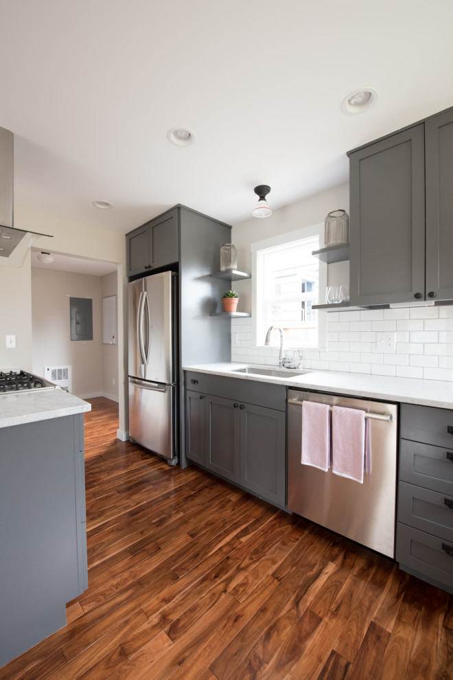 Example of a transitional kitchen design in Seattle
