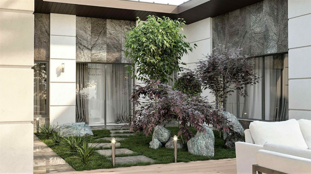 Современный одноэтажный дом с патио