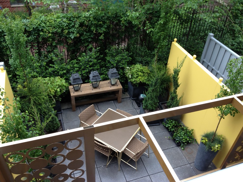 This is an example of an eclectic patio in New York.