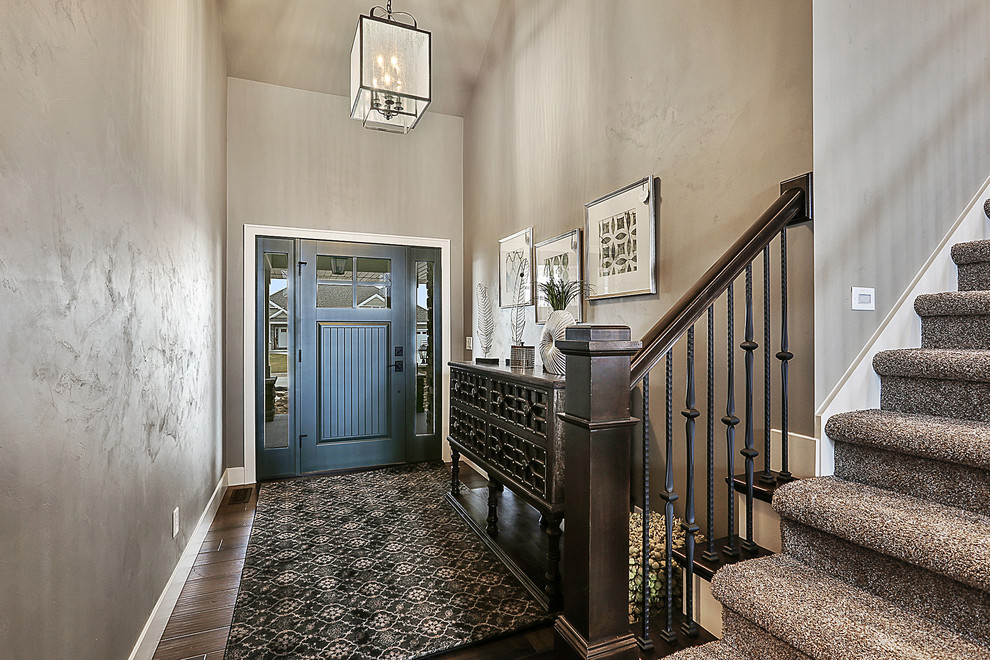 Single front door - dark wood floor single front door idea with a green front door