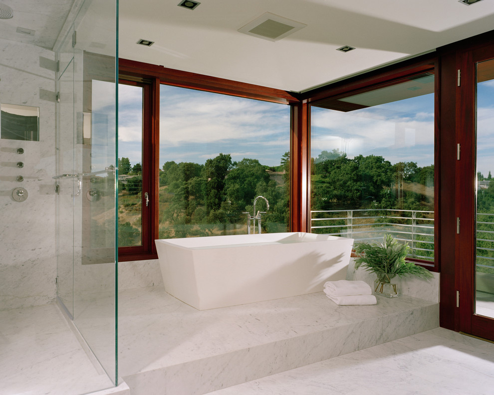 Design ideas for a large modern master bathroom in San Francisco with a freestanding tub, a curbless shower and marble floors.
