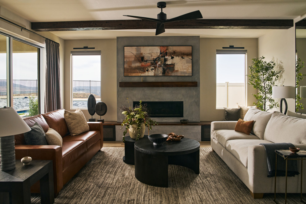 Living room - large transitional formal carpeted, brown floor and exposed beam living room idea in Los Angeles with gray walls, a standard fireplace, a concrete fireplace and a concealed tv