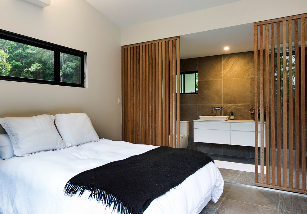 Design ideas for a contemporary bedroom in Wollongong.