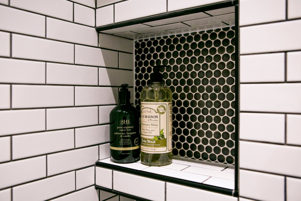 Example of a large transitional master black and white tile and subway tile porcelain tile, black floor and double-sink walk-in shower design with shaker cabinets, black cabinets, a two-piece toilet, an undermount sink, quartz countertops, a hinged shower door, multicolored countertops and a built-in vanity