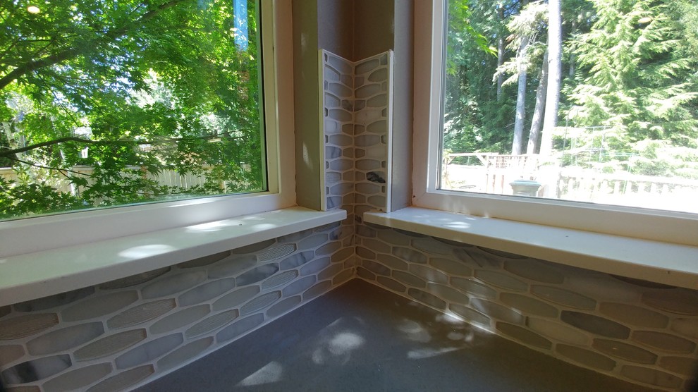 Inspiration for a kitchen remodel in Seattle with quartz countertops and mosaic tile backsplash
