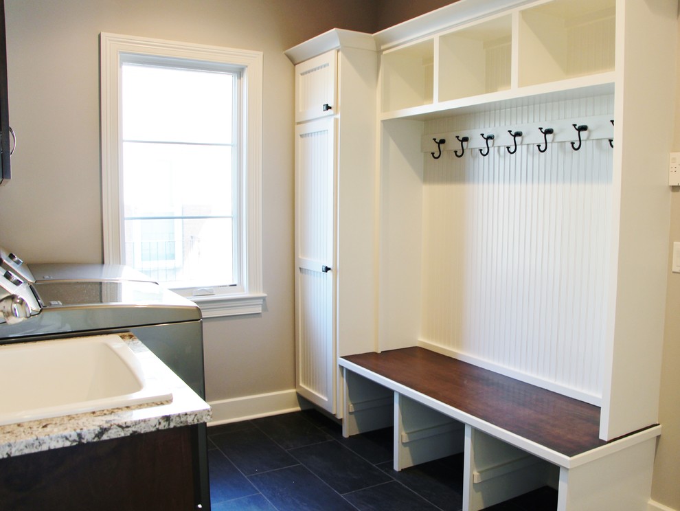 This is an example of a transitional laundry room in Chicago.