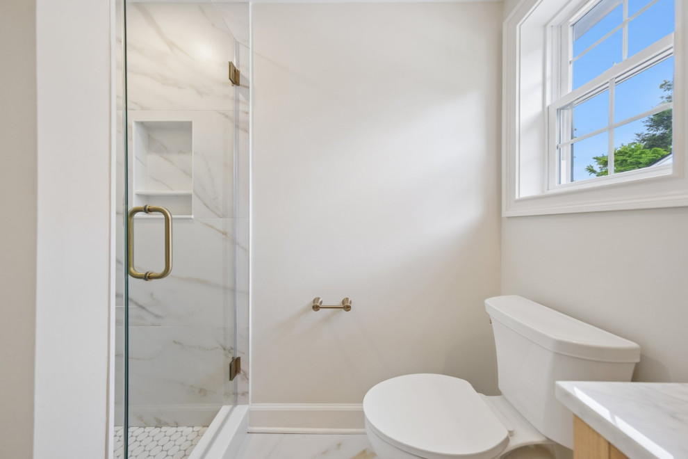 Marble-Tiled Bathroom in Teaneck, NJ Home Remodel