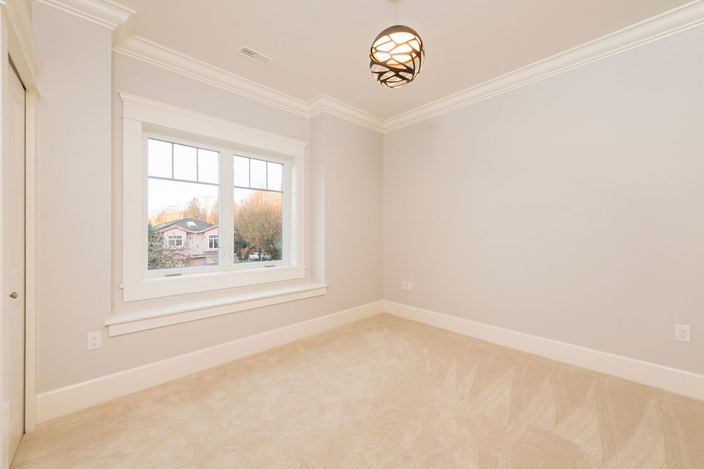 Large transitional guest bedroom in Vancouver with grey walls, carpet and no fireplace.