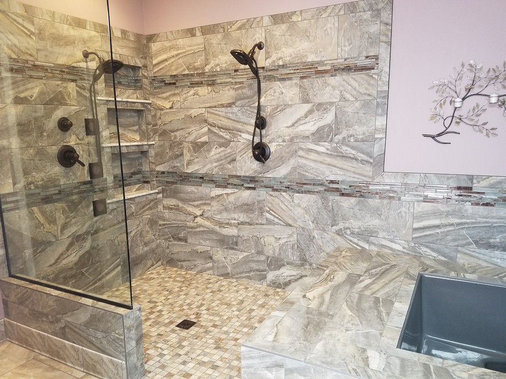 Example of a mid-sized transitional master corner shower design with shaker cabinets, dark wood cabinets, an undermount tub, purple walls and an undermount sink